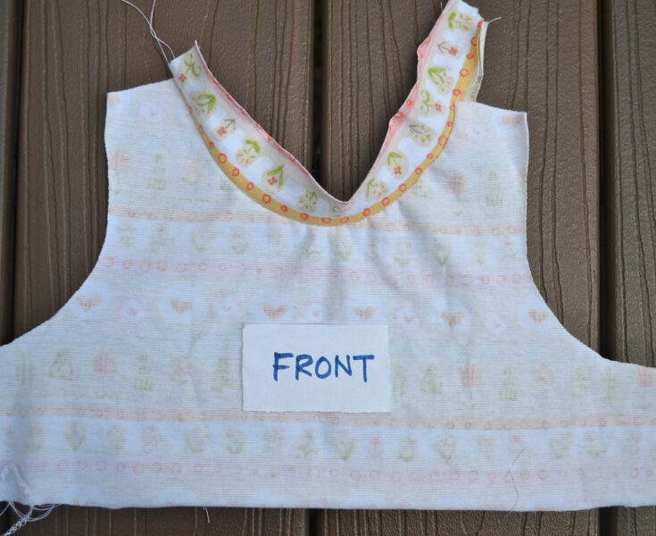 Binding with knit fabric t-shirt. Learn how to make the best knit fabric projects with these amazing tutorials. Every tip, you needed on how to sew with knit fabrics finally in one place.