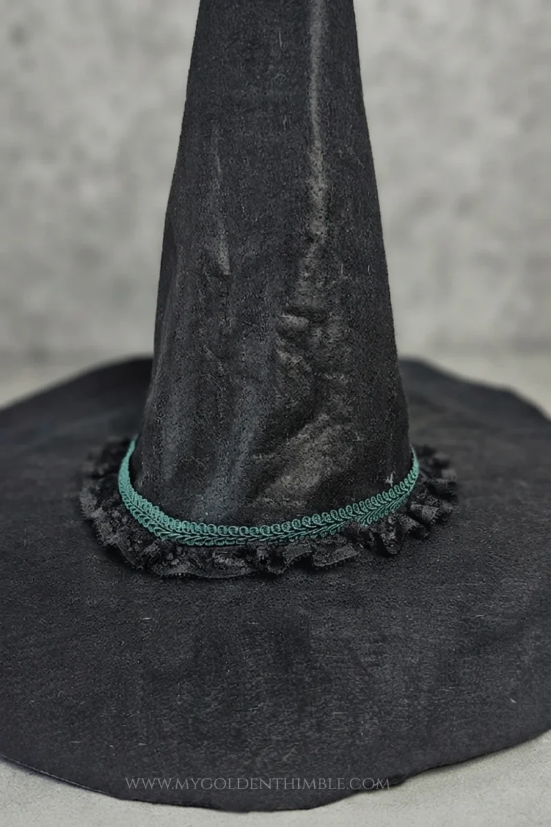 witch hat made with a free sewing pattern on a grey background with fog
