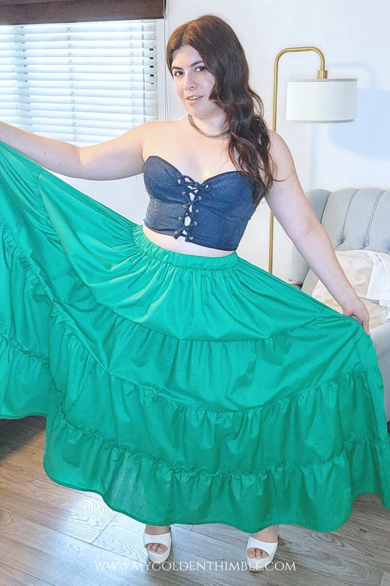 girl with a green tiered skirt