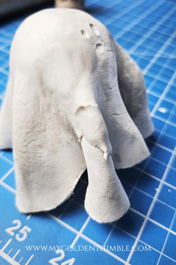 smothing air dry clay with water