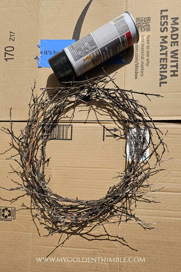 branches over cardboard box