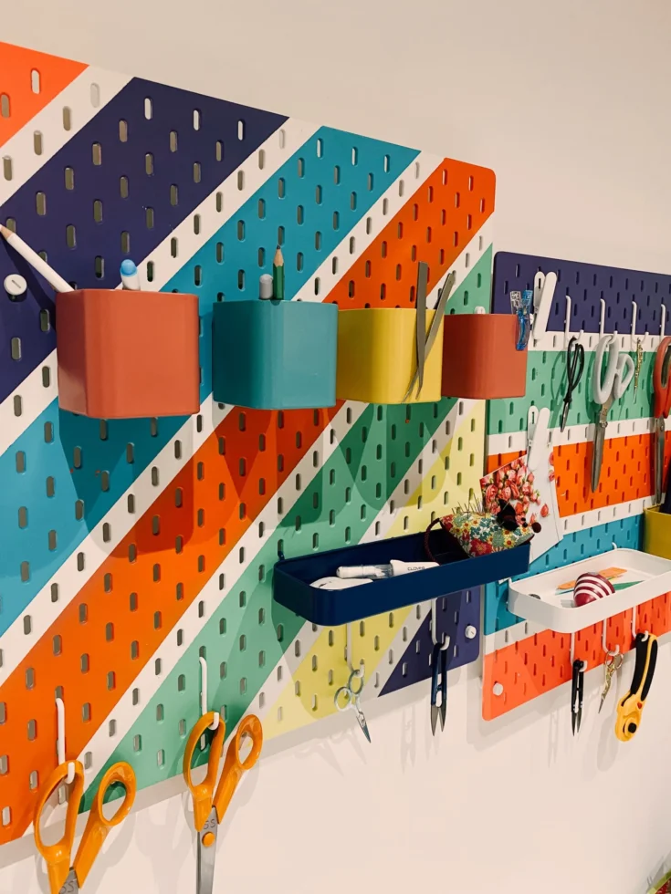 bright pegboard with sewing tools