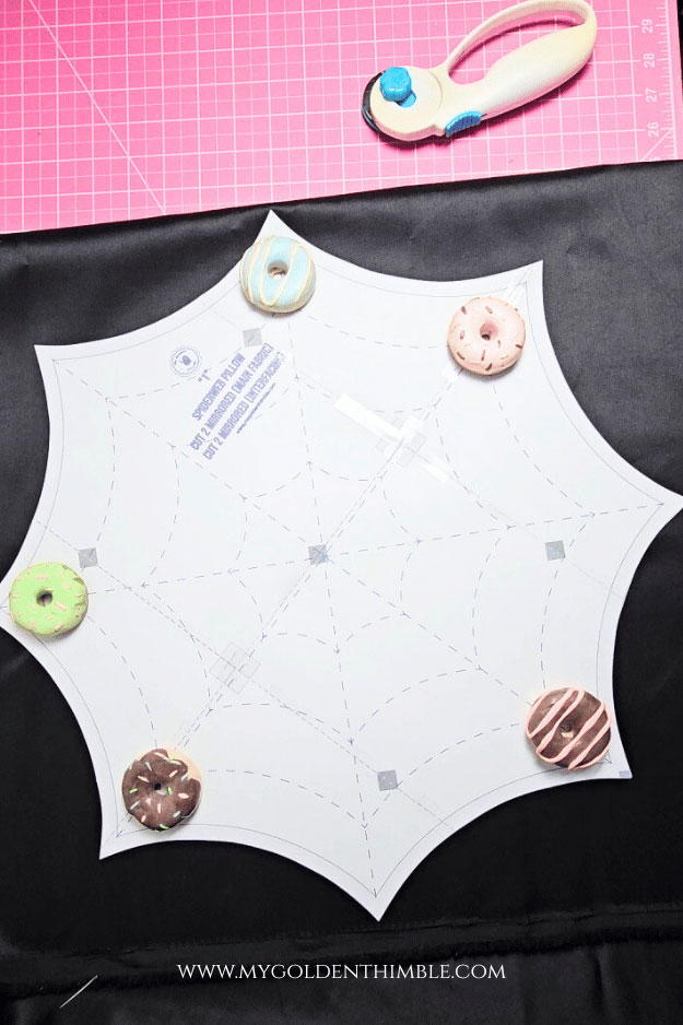 process of sewing a spider web pillow