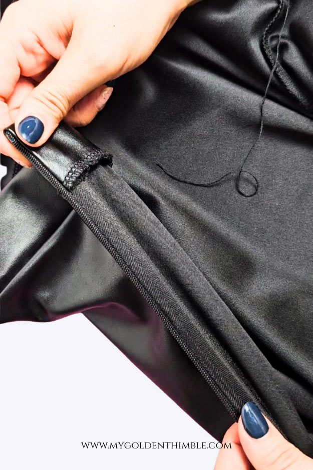 close up of the inside of a skirt showing an invisible zipper