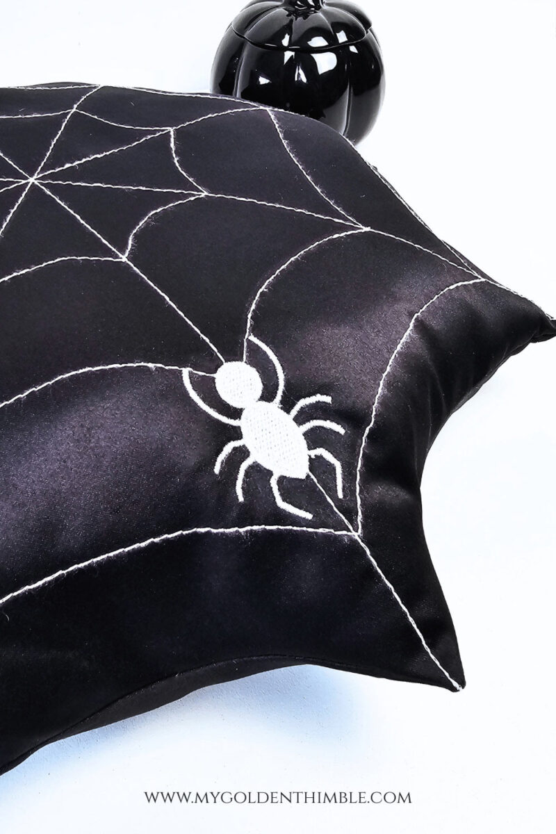 close up of spider web pillow diy