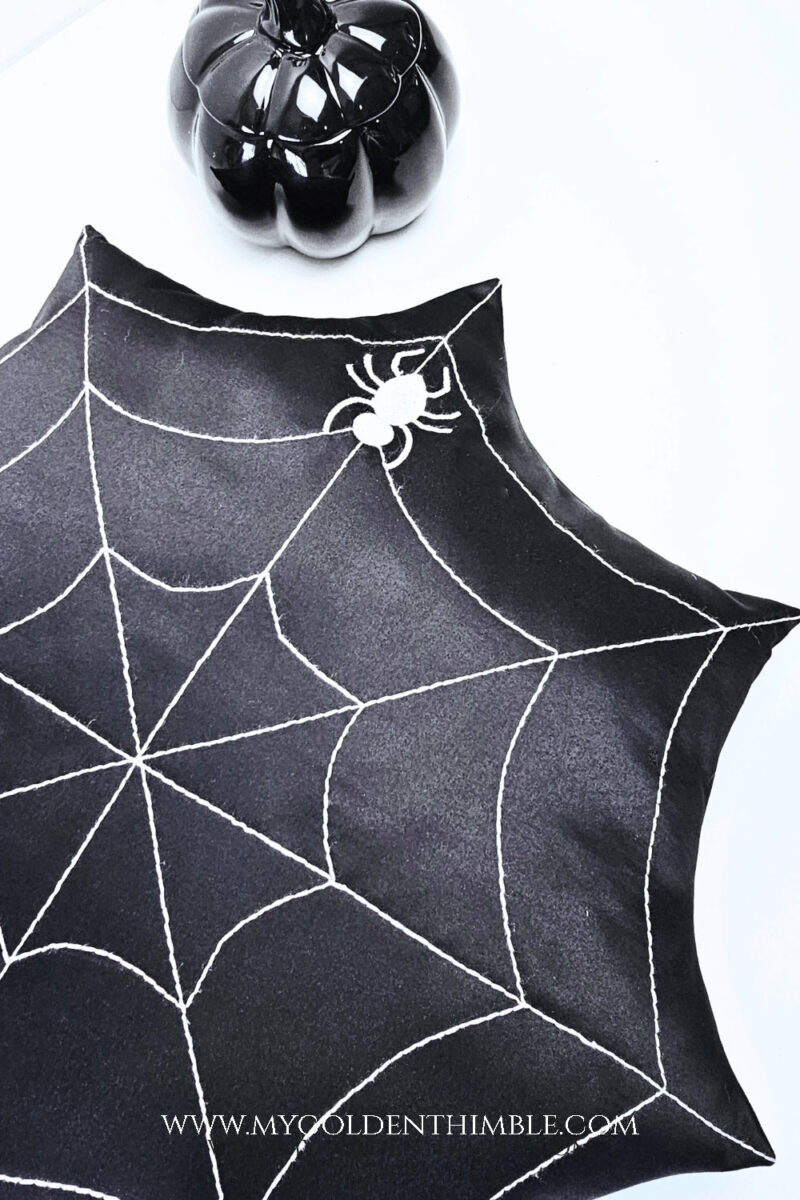 close up of spider web pillow diy