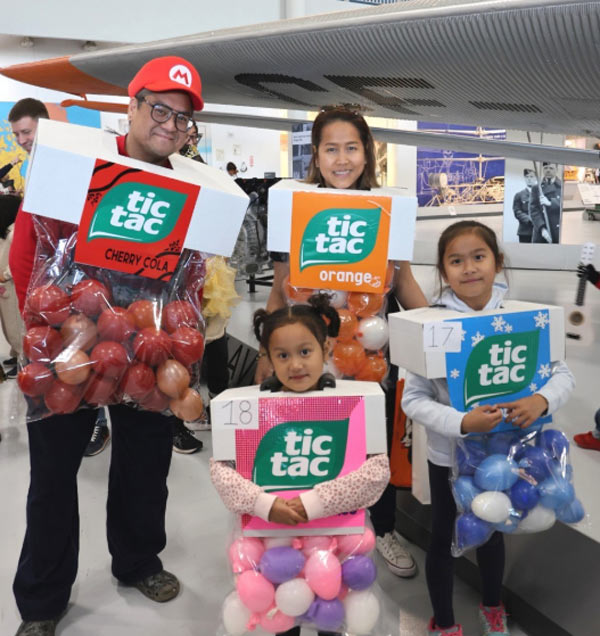 family wearing tic tac costumes