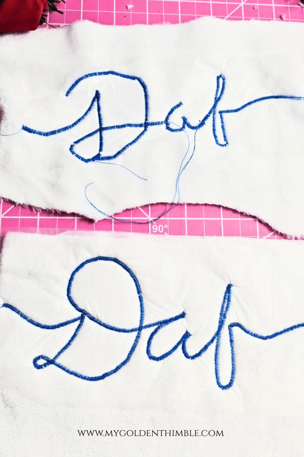 practice fabric showing two different test lettering attempts