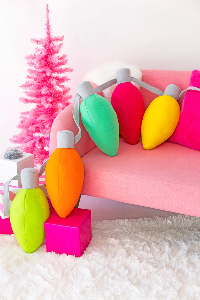 throw pillows in bright colors christmas lights themed