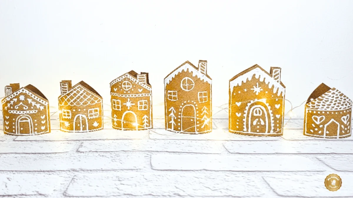 Gingerbread house garland made from recycled cardboard Christmas crafts