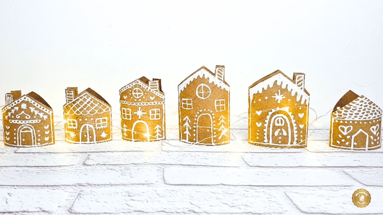 Gingerbread house garland made from recycled cardboard Christmas crafts