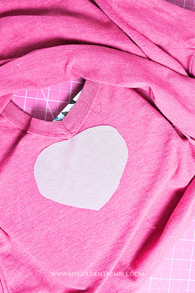 back of a t-shirt with a piece of fusible interfacing on the back