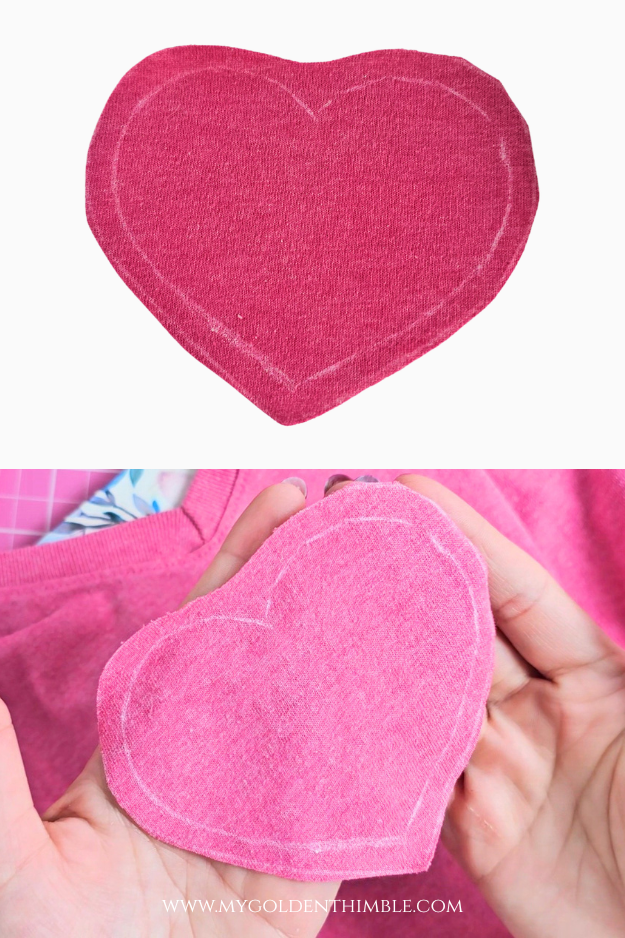 Marking a heart shape on a white T-shirt with soap as a fabric marking tool