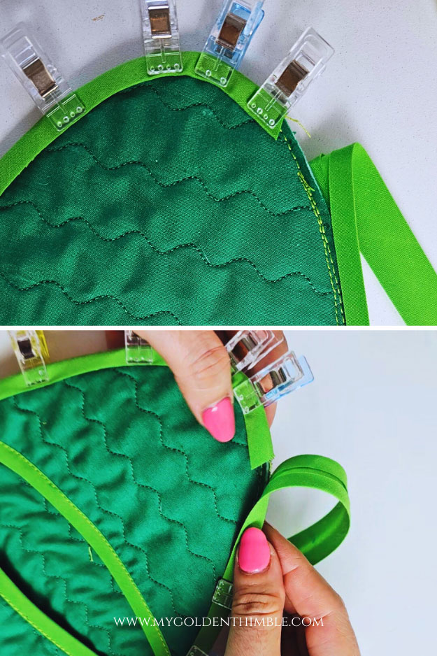 Attaching bias tape around the edge of the Easter egg potholder