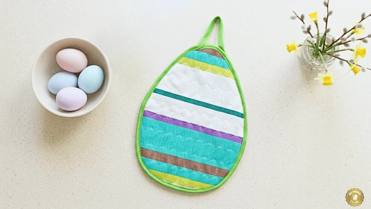 Quilted Easter egg potholder with decorative stitches