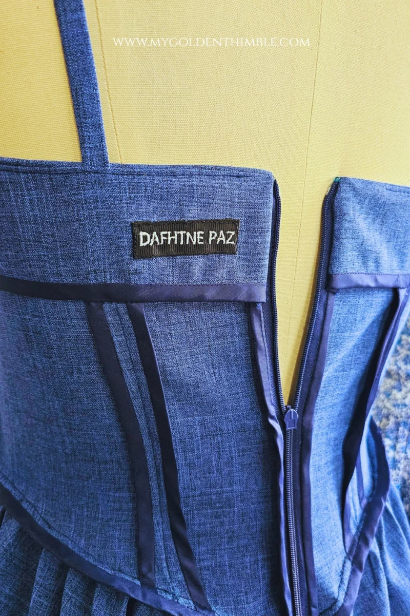 Close up of sewn label on a dress