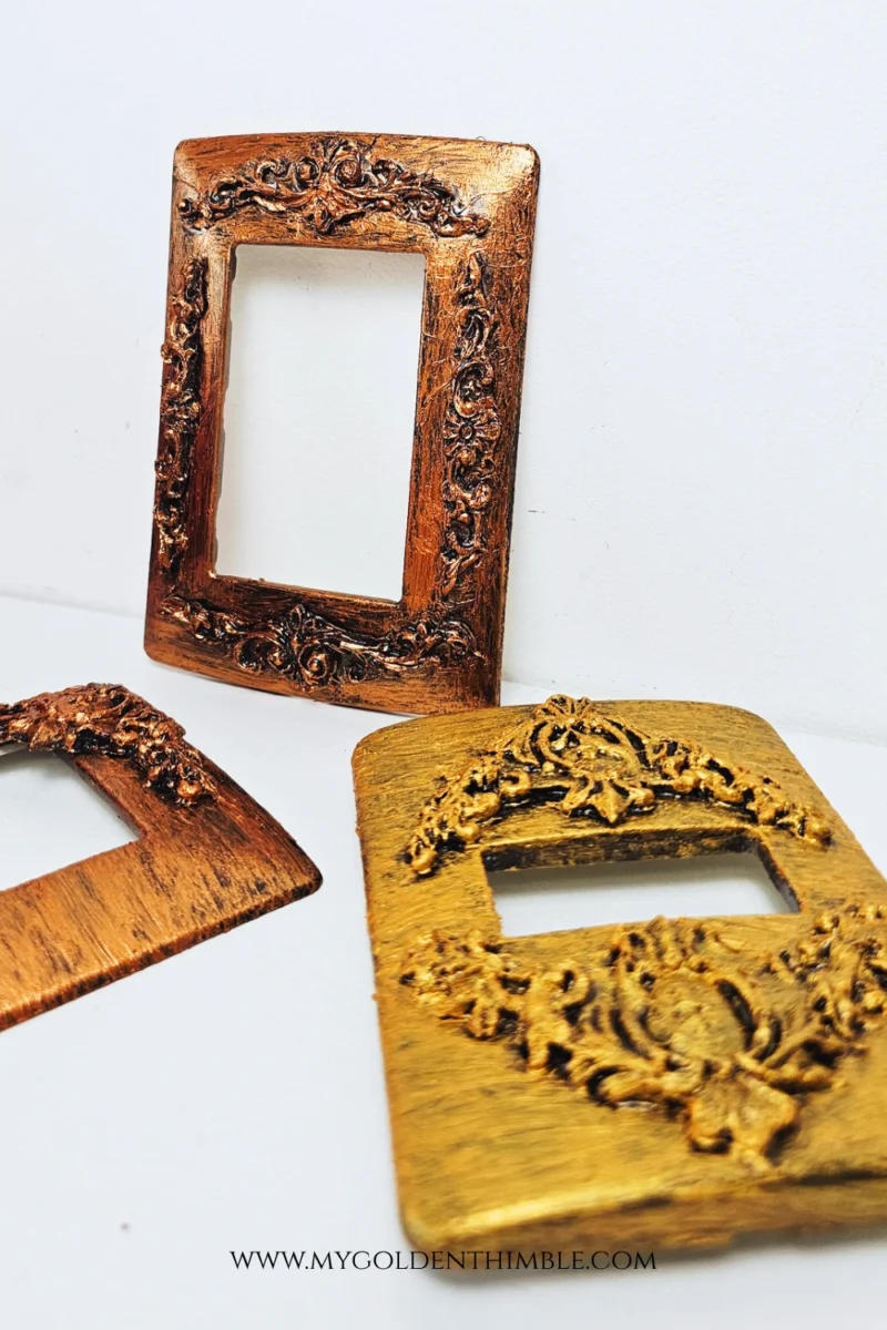 Vintage style light switch cover with aged copper look close-up