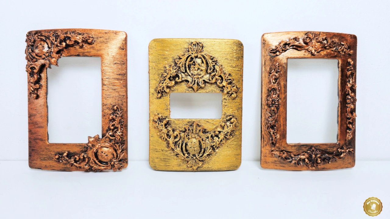 Decorative vintage light switch cover with ornate flourish details