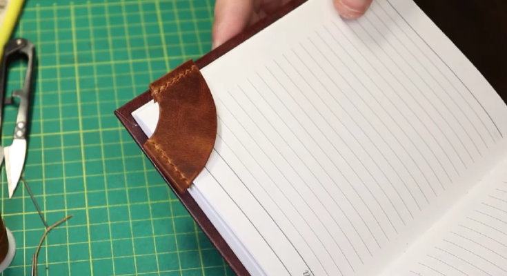 Leather Corner Bookmark on a book