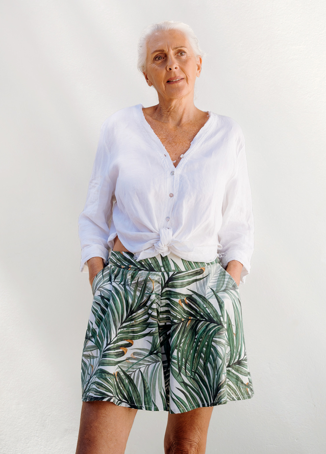 woman wearing shorts made with a free sewing pattern
