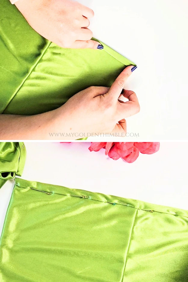 Folding the edge twice to create the strap channel.