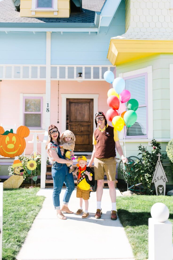 family wearing a costume from up
