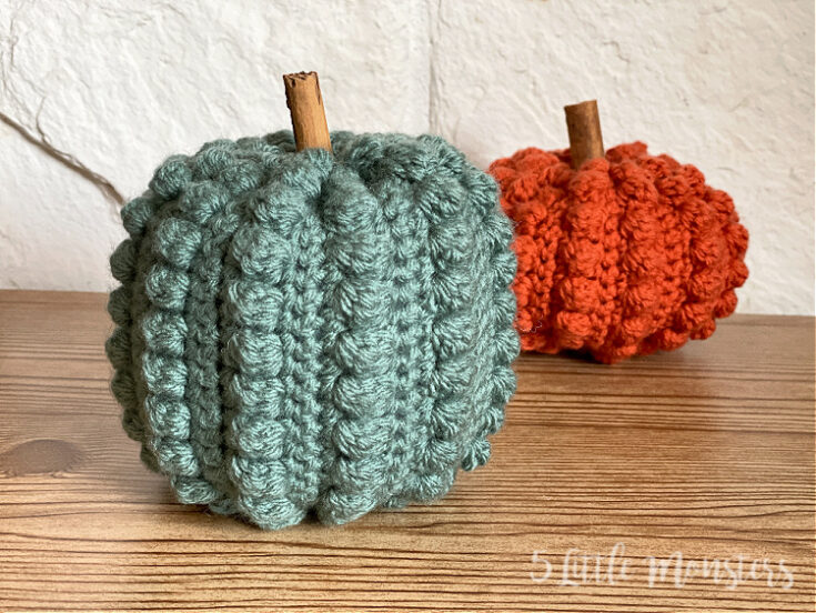 Crochet pumpkins in green and orange with textured bobble stitches