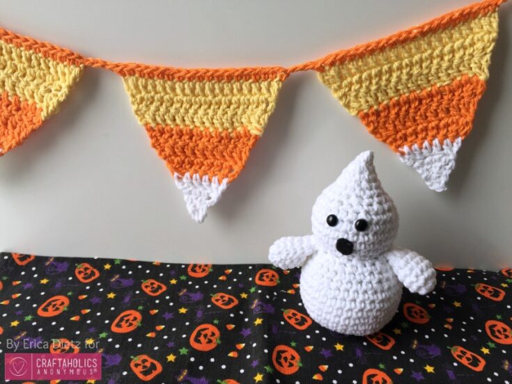 Crochet Halloween decorations including an orange and yellow bunting and a white ghost