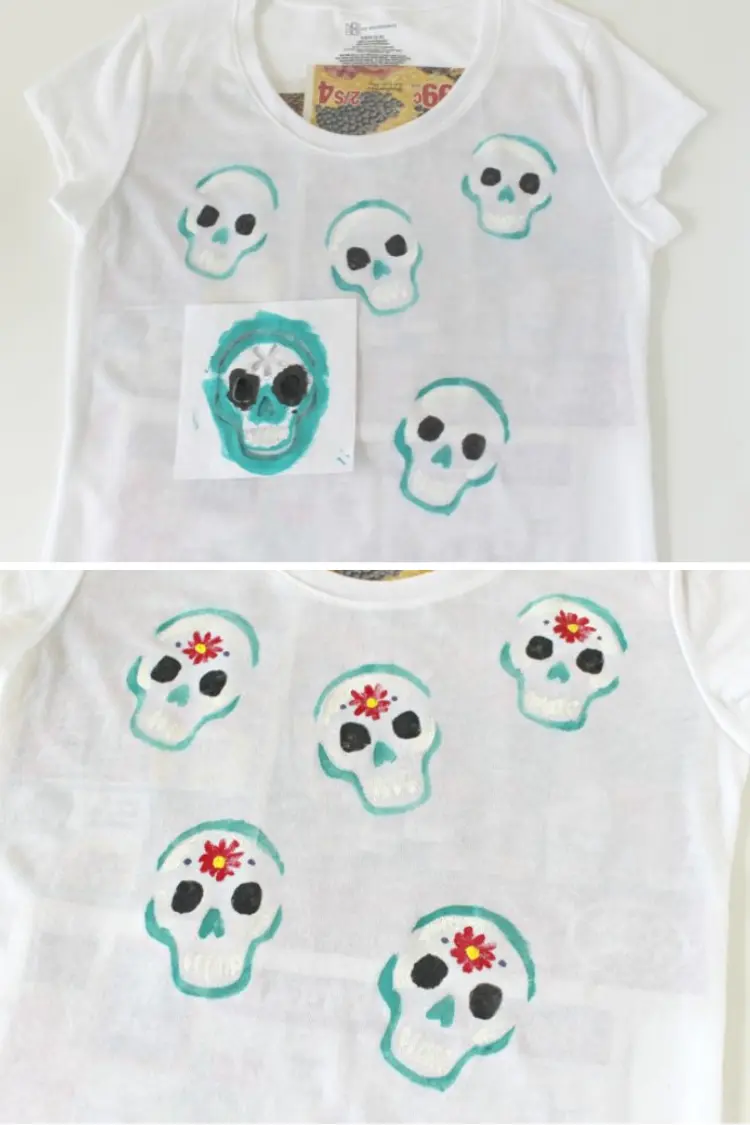 White T-shirt stamped with turquoise and red sugar skull craft patterns.